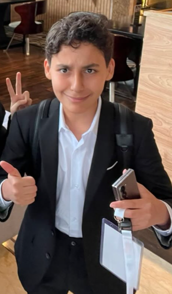 Omar at a formal student event