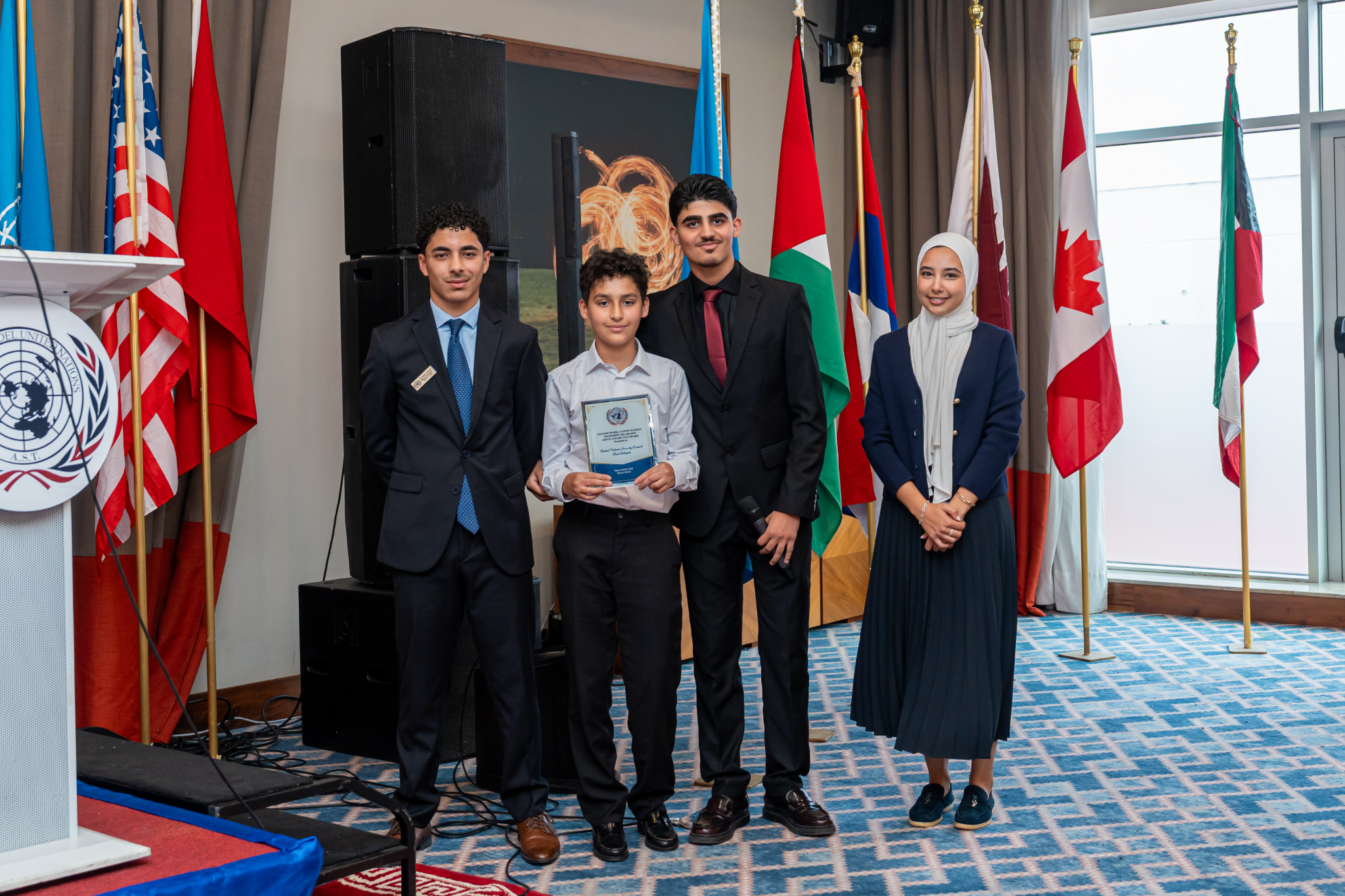 Omar receiving recognition at a Model United Nations event